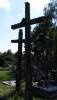 Two wooden crosses on the cemetery in Szudziaowo